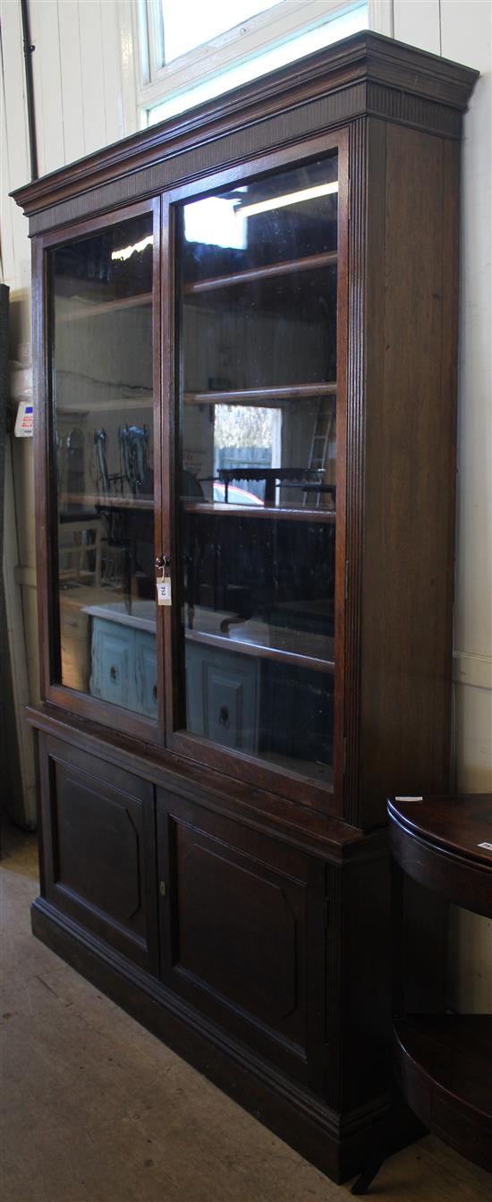 Late Victorian oak glazed bookcase(-)